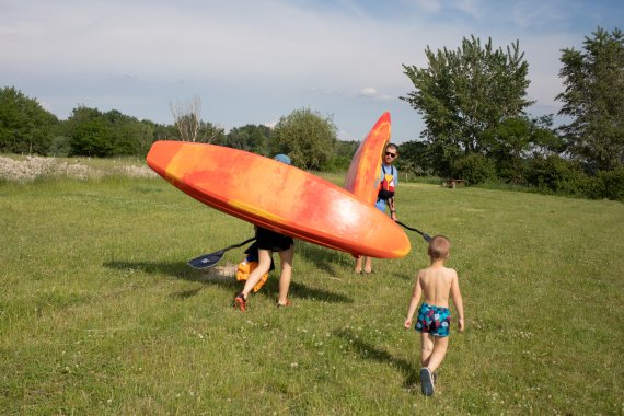 The Csonka family with their kayaks on the way to the Danube