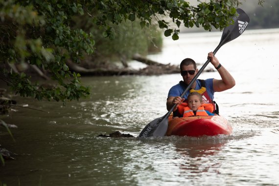 Peter Csonka paddling with his son