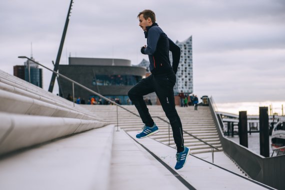 Alexander Zimmermann climbing stairs in Hamburg